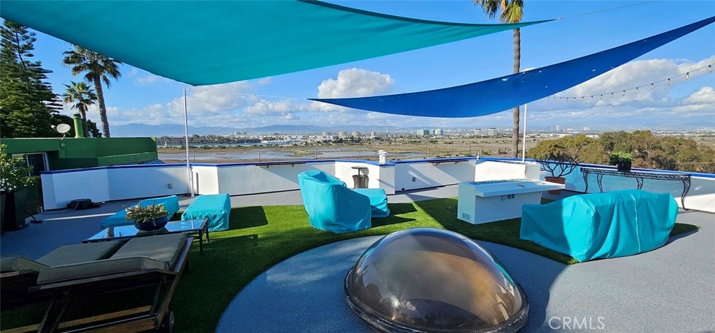 8109 Sinaloa Road Playa del Rey, CA 90293 - Photo 4 of 19 a view of a chairs and table in the patio