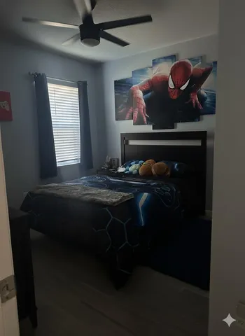 a living room with hard wood floor
