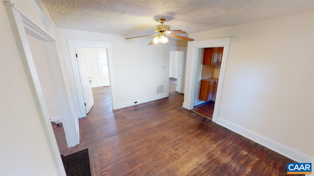 241 Shamrock Road Charlottesville, VA 22903 - Photo 14 of 24 wooden floor in an empty room with a window