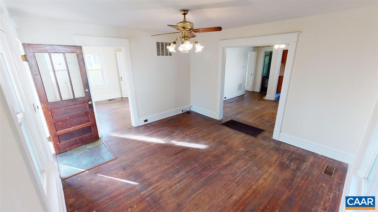 241 Shamrock Road Charlottesville, VA 22903 - Photo 3 of 24 wooden floor in an empty room with a mirror