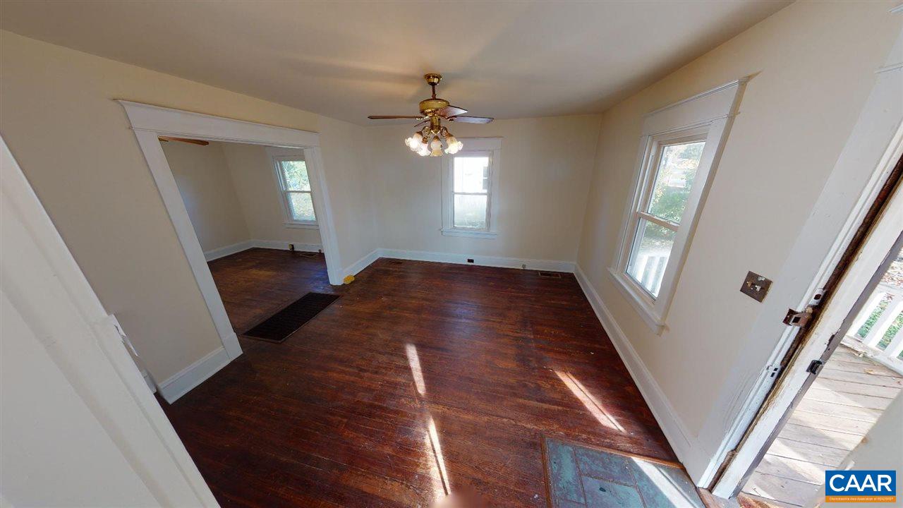 241 Shamrock Road Charlottesville, VA 22903 - Photo 8 of 24 wooden floor in an empty room with a window