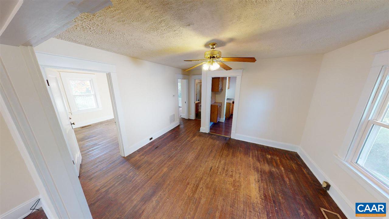 241 Shamrock Road Charlottesville, VA 22903 - Photo 10 of 24 wooden floor in an empty room with a window