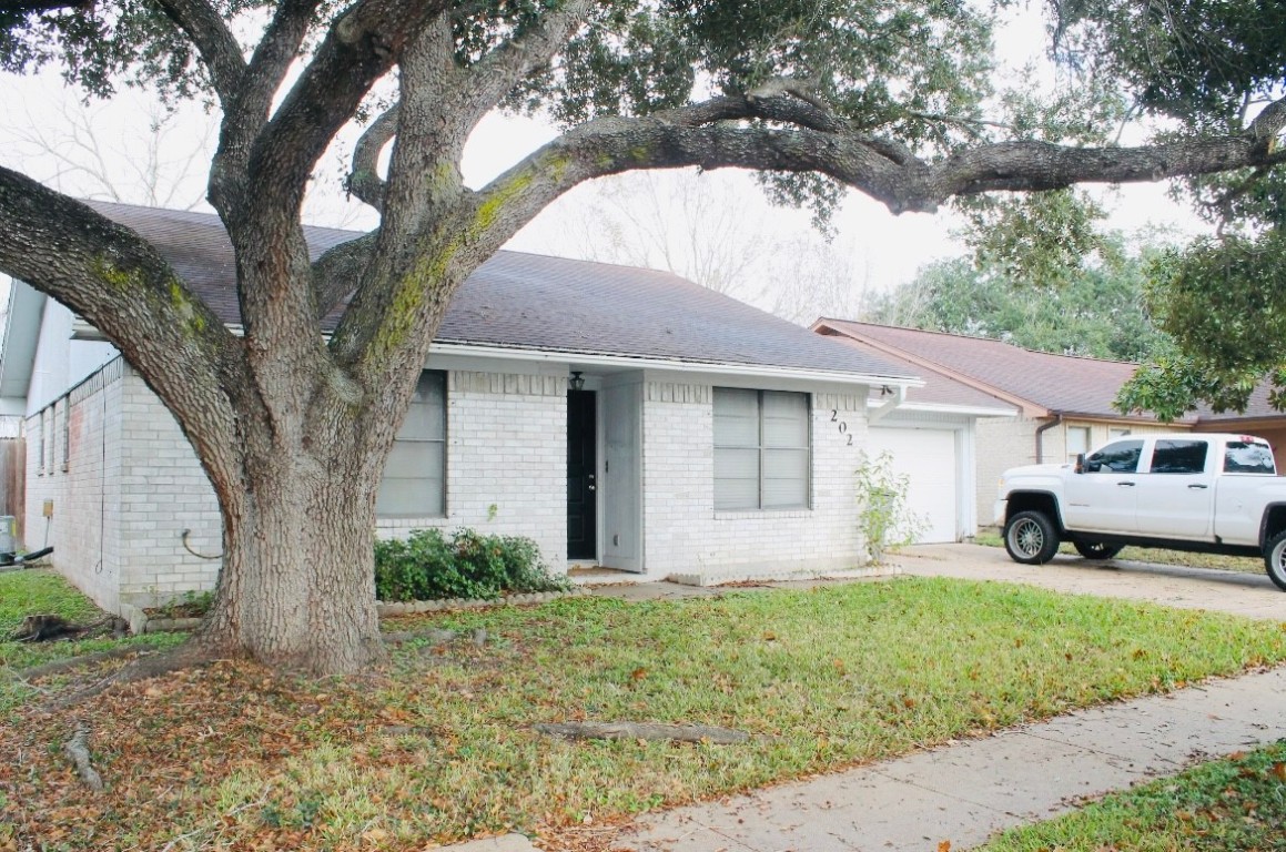 202 Byron Drive Victoria, TX 77901 - Photo 1 of 7 a house view with a garden space