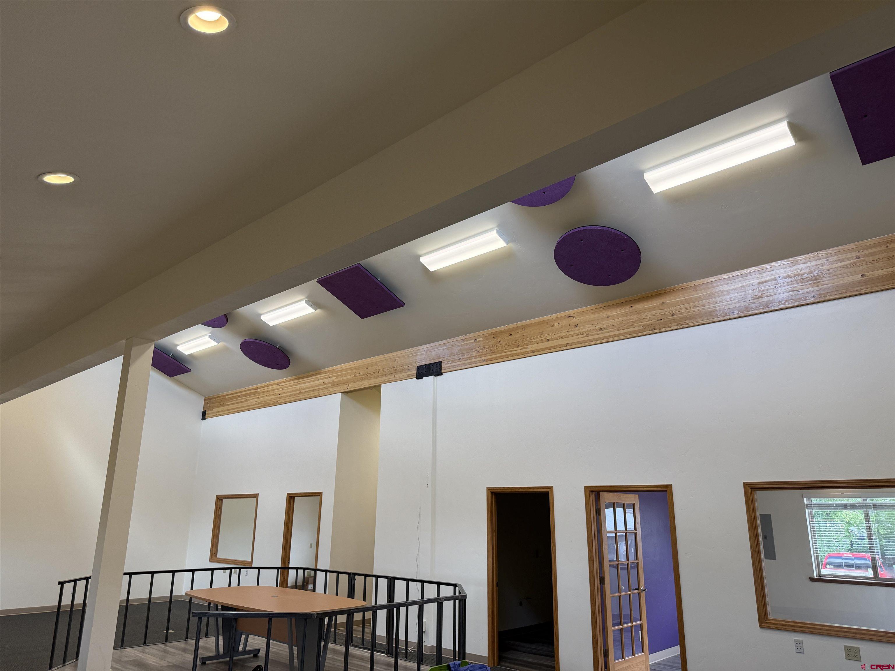 691 County Road 233, Unit B7 & B8 Durango, CO 81301 - Photo 11 of 31 a view of a hallway with windows