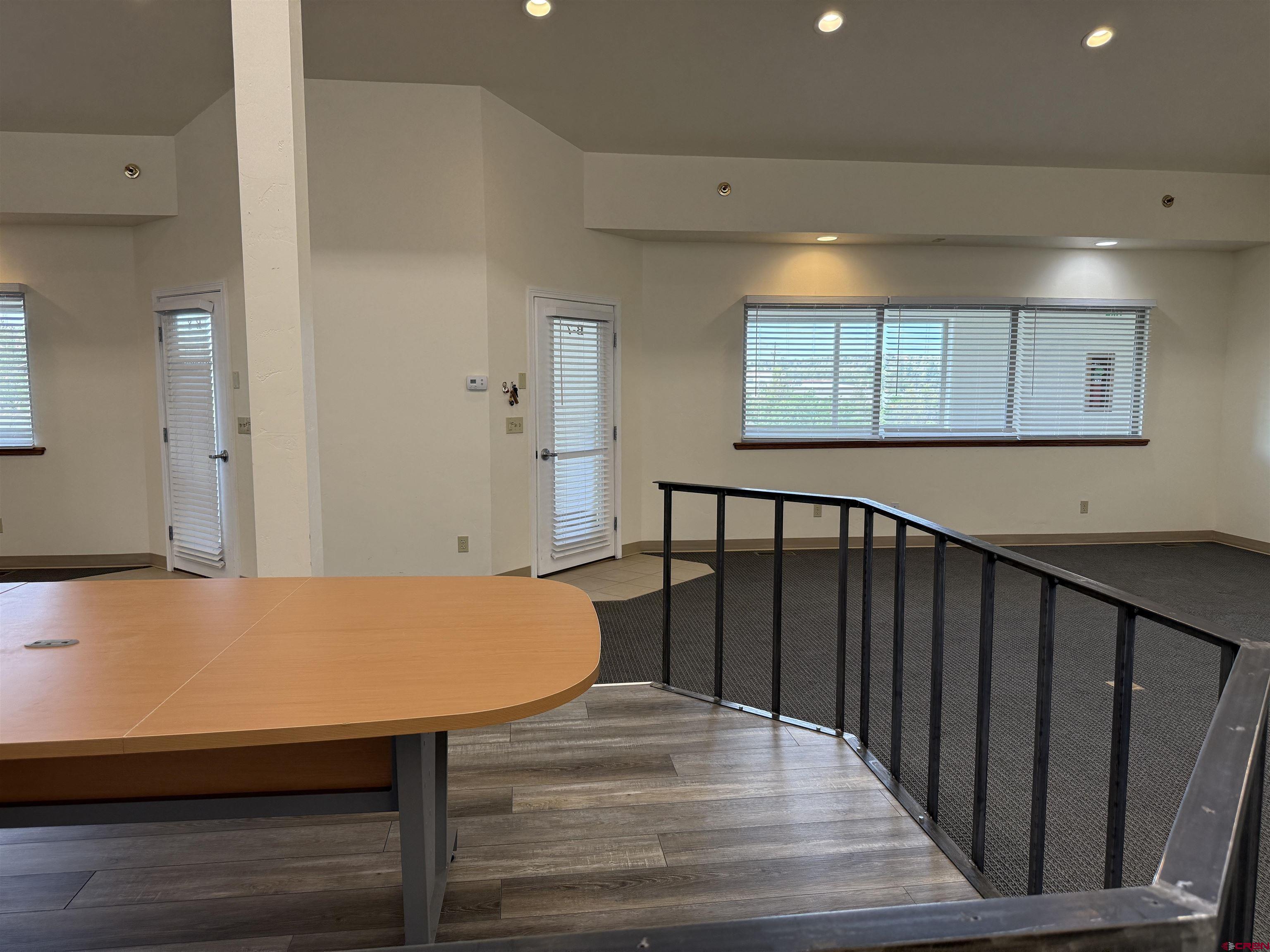 691 County Road 233, Unit B7 & B8 Durango, CO 81301 - Photo 15 of 31 a view of kitchen with furniture and wooden floor