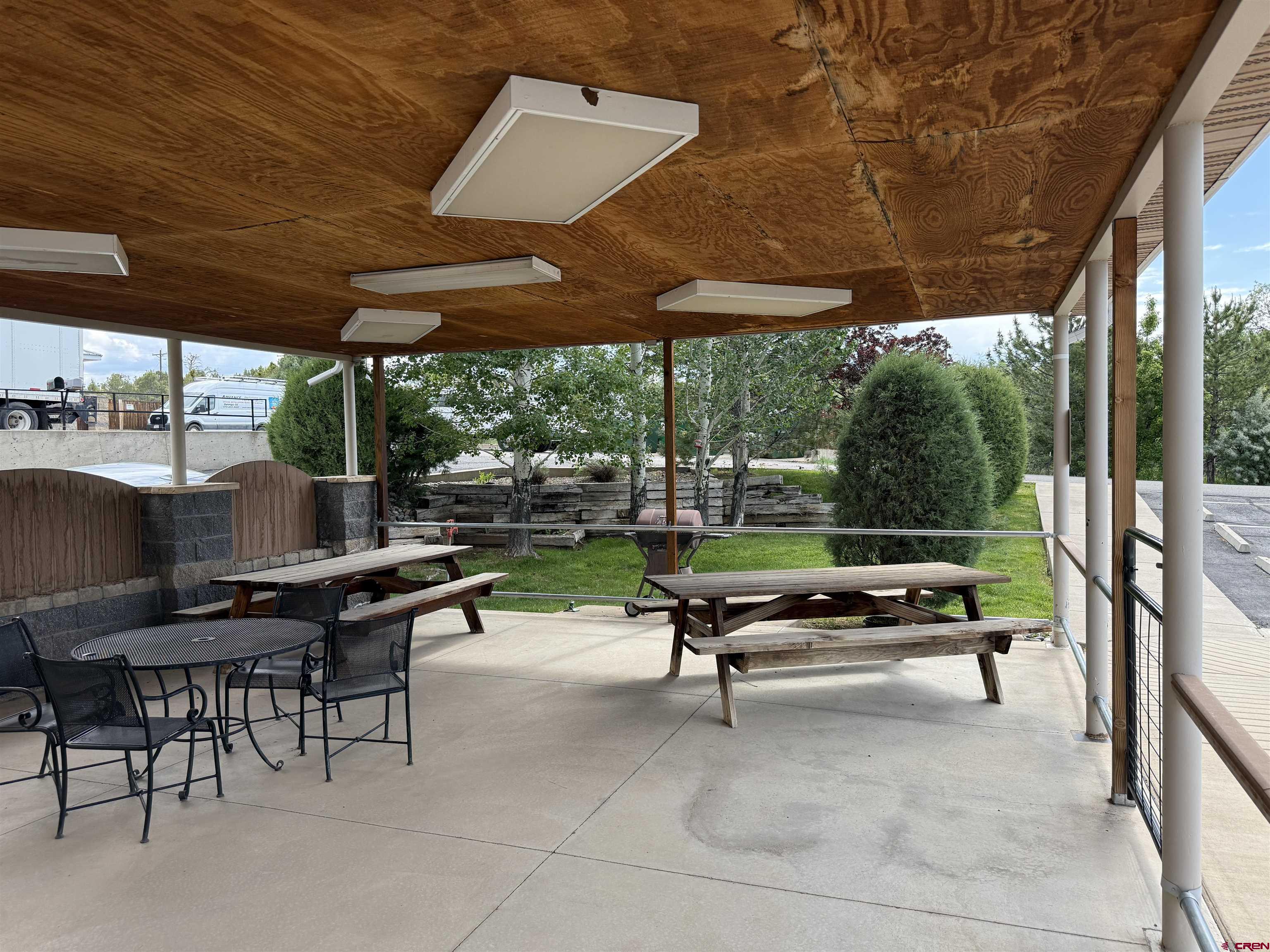 691 County Road 233, Unit B7 & B8 Durango, CO 81301 - Photo 29 of 31 a backyard view of a patio with a table and chairs