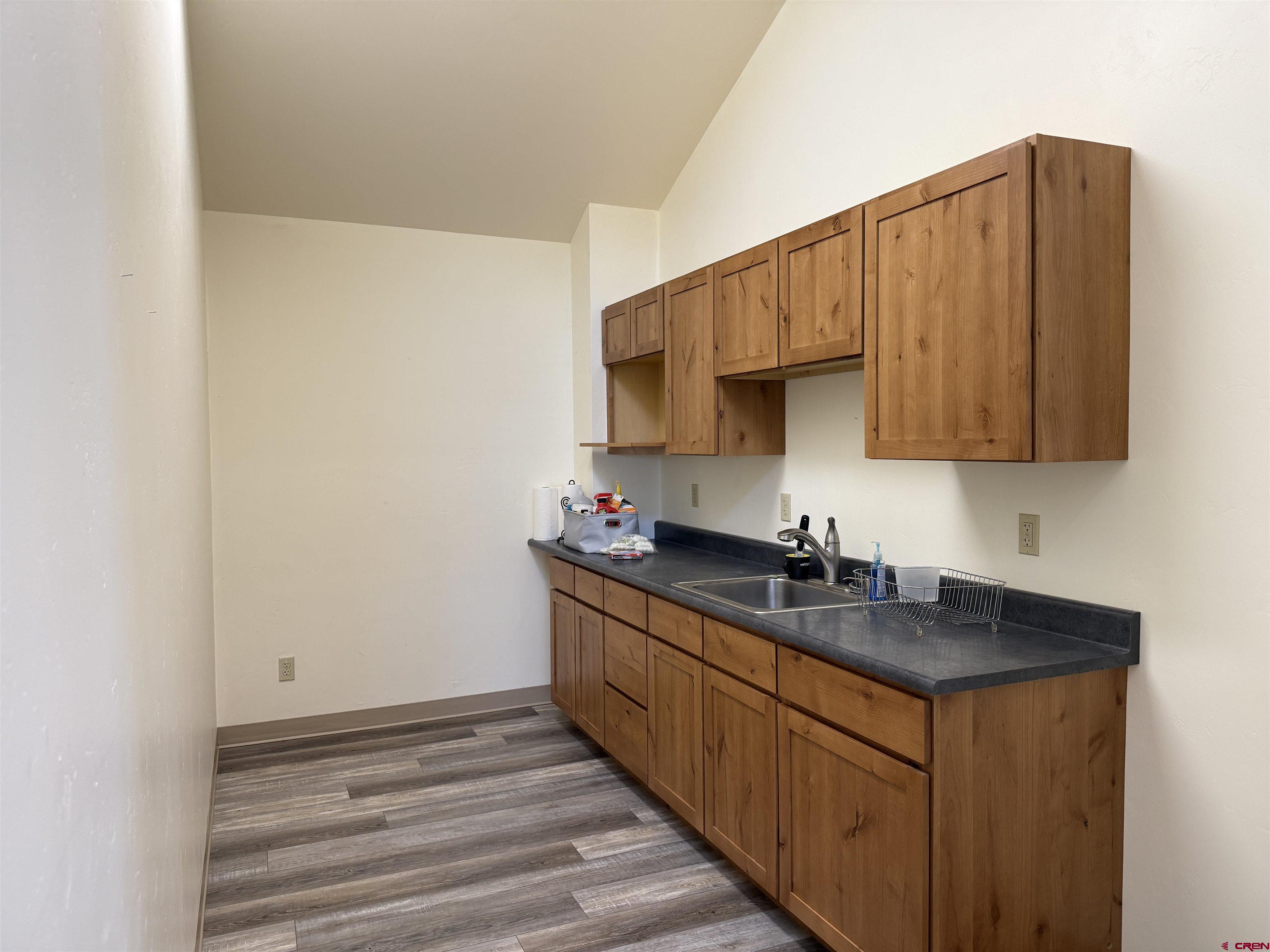 691 County Road 233, Unit B7 & B8 Durango, CO 81301 - Photo 3 of 31 a kitchen with stainless steel appliances granite countertop a sink stove and cabinets