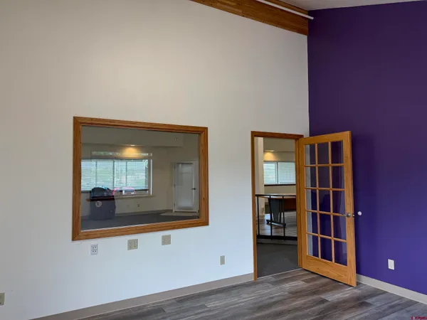 a view of livingroom with furniture and wooden floor