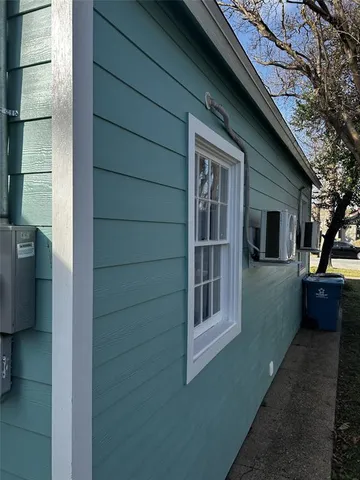 a house view with a backyard space