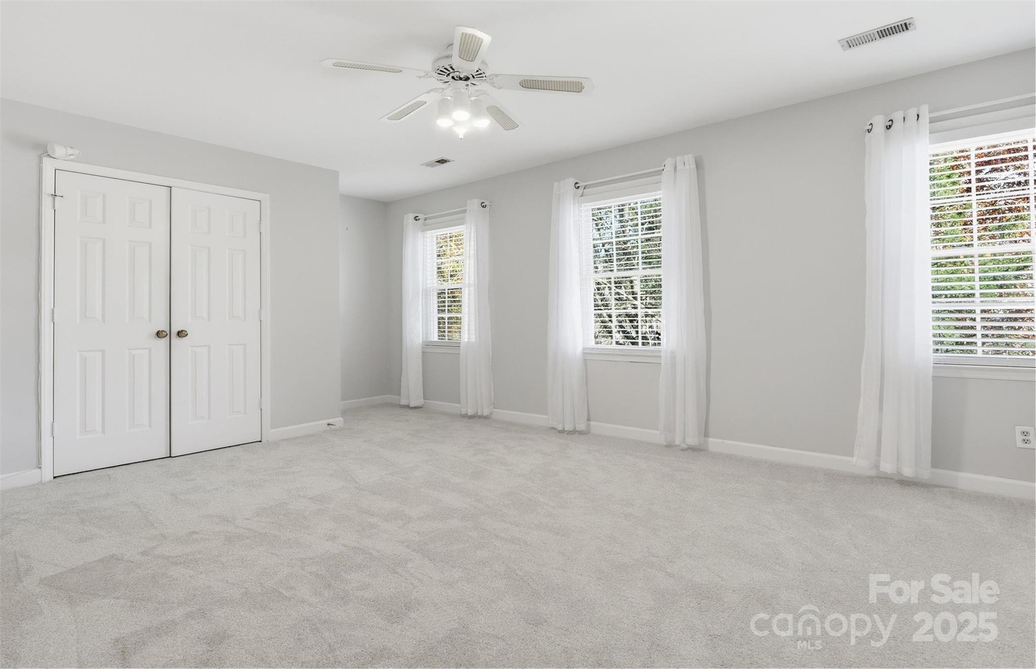 2621 Brightmoor Ridge Drive Matthews, NC 28105 - Photo 11 of 24 a view of an empty room with a window
