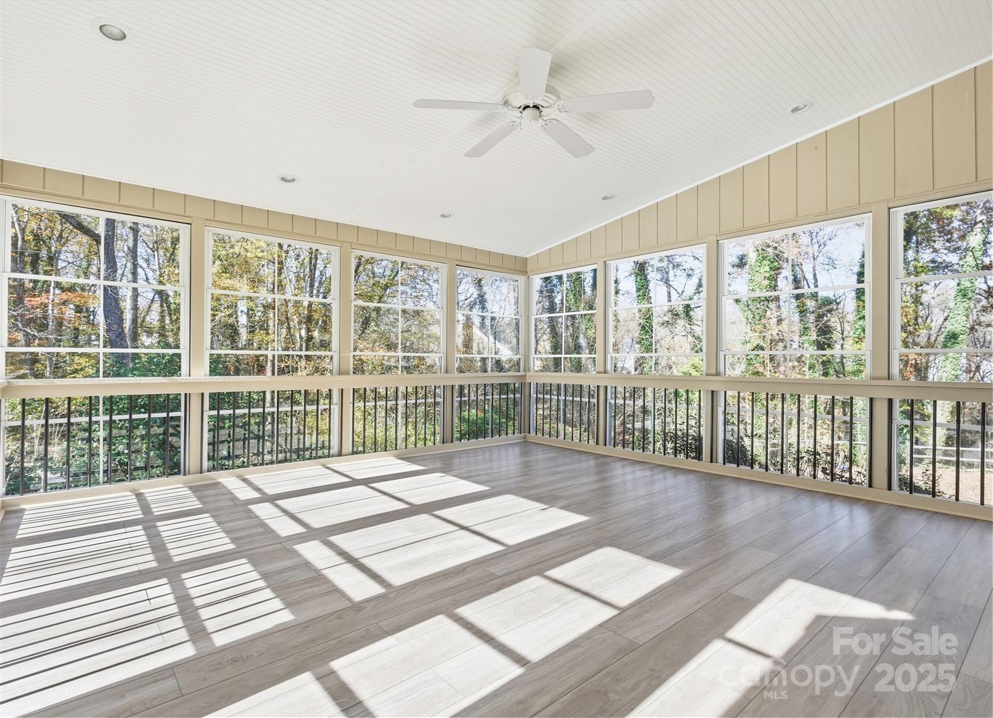 2621 Brightmoor Ridge Drive Matthews, NC 28105 - Photo 14 of 24 a view of a room with balcony and wooden floor