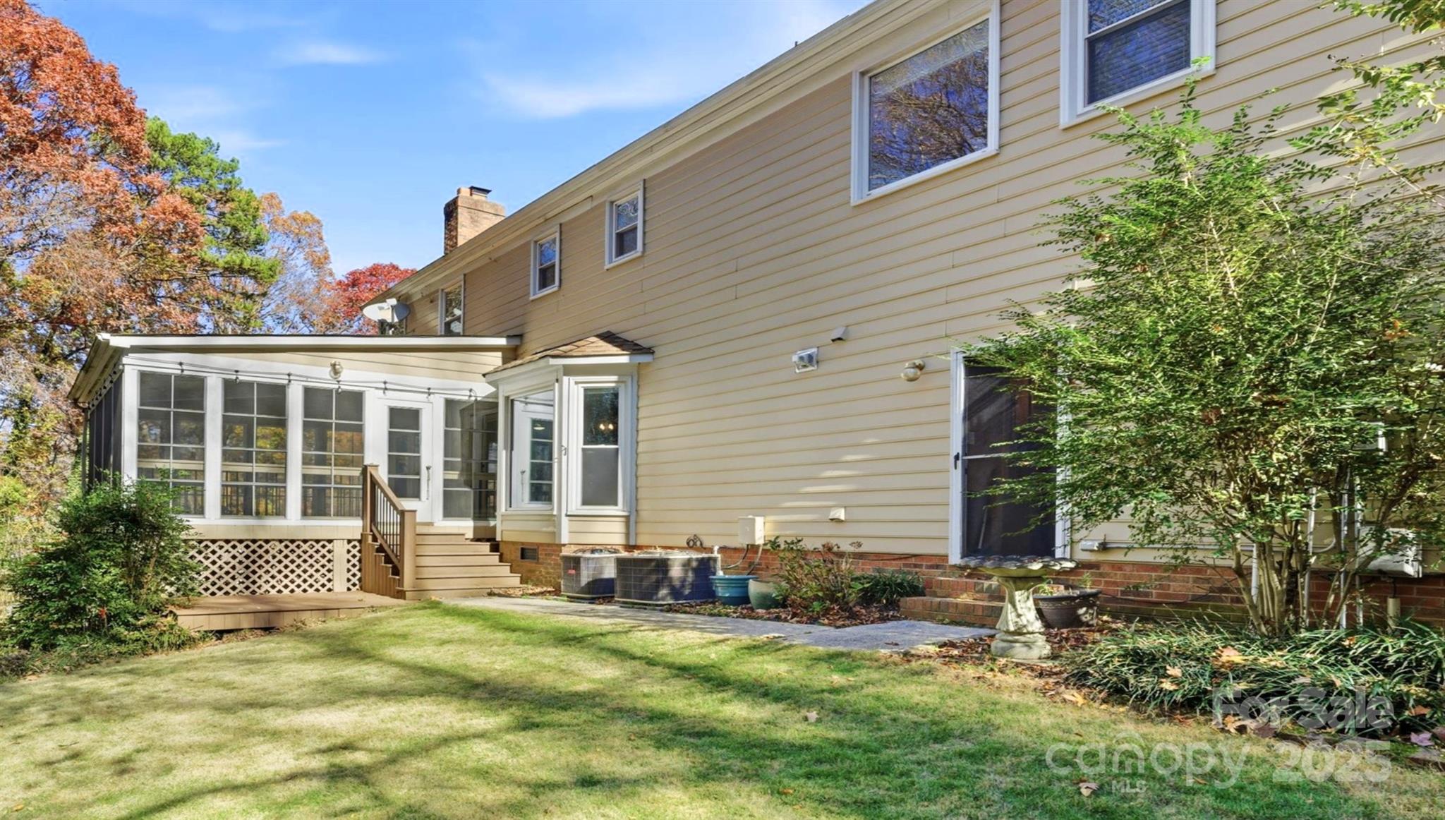 2621 Brightmoor Ridge Drive Matthews, NC 28105 - Photo 15 of 24 a view of a house with backyard and sitting area
