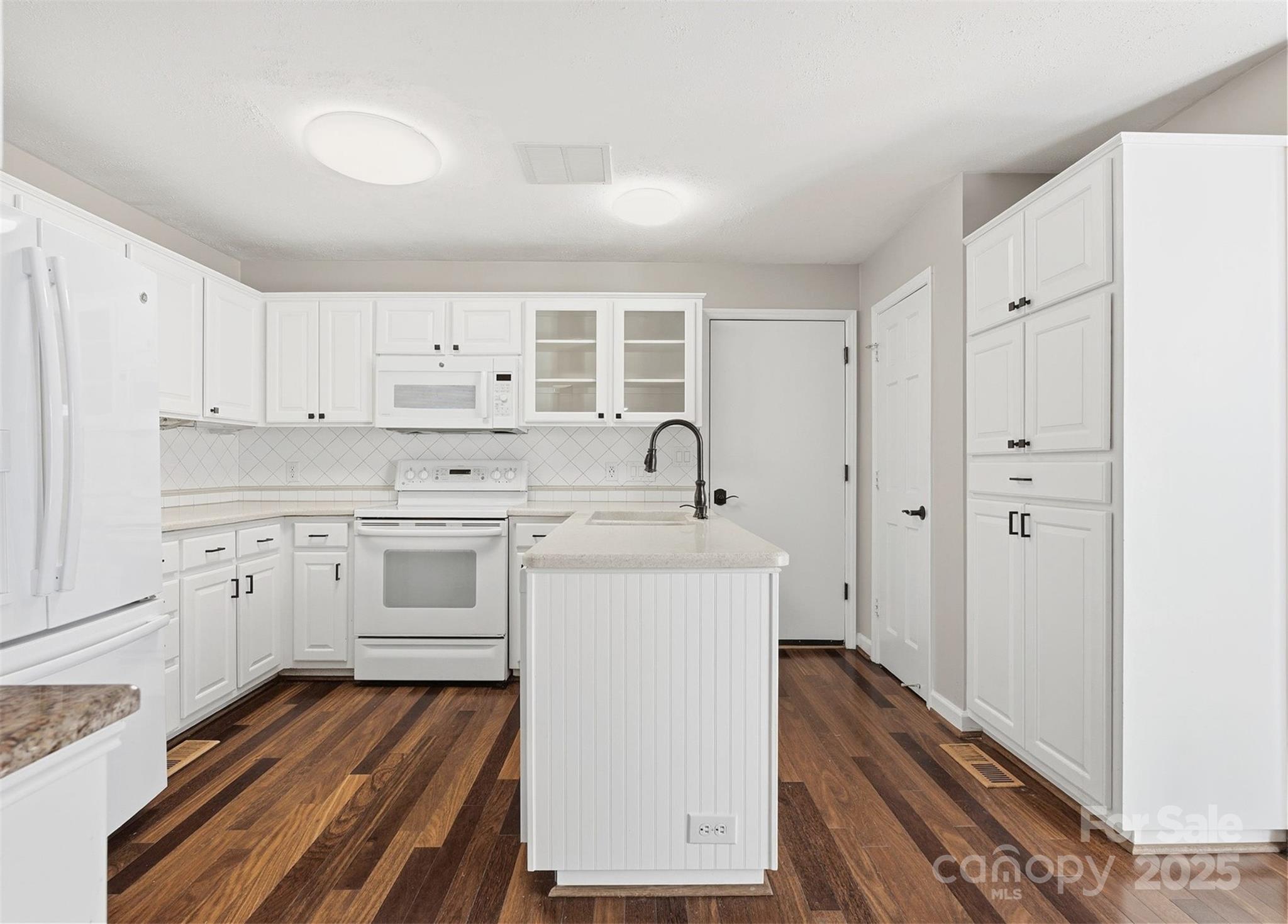 2621 Brightmoor Ridge Drive Matthews, NC 28105 - Photo 4 of 24 a kitchen with cabinets appliances and a counter space