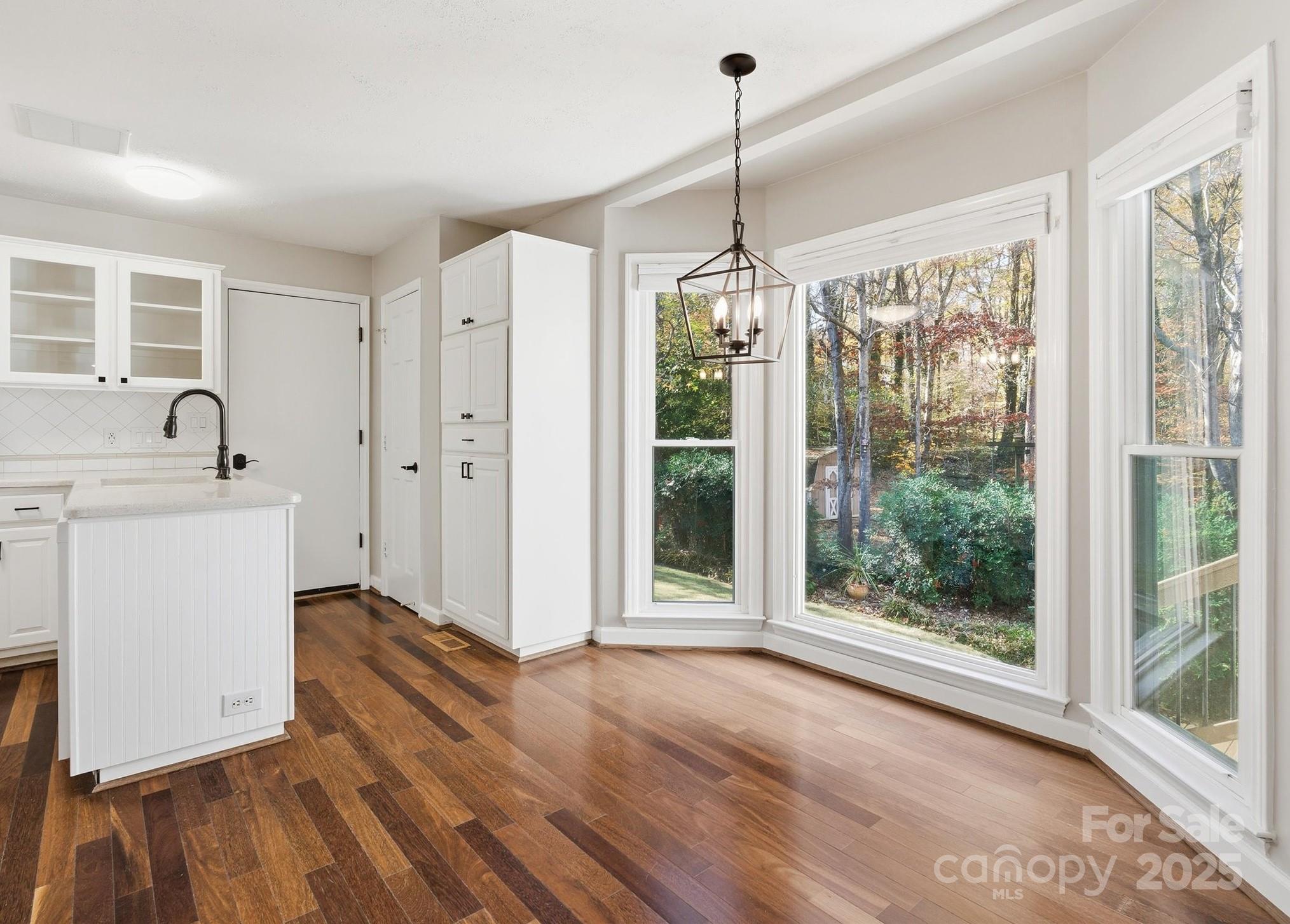 2621 Brightmoor Ridge Drive Matthews, NC 28105 - Photo 5 of 24 a view of a room with window wooden floor and front door