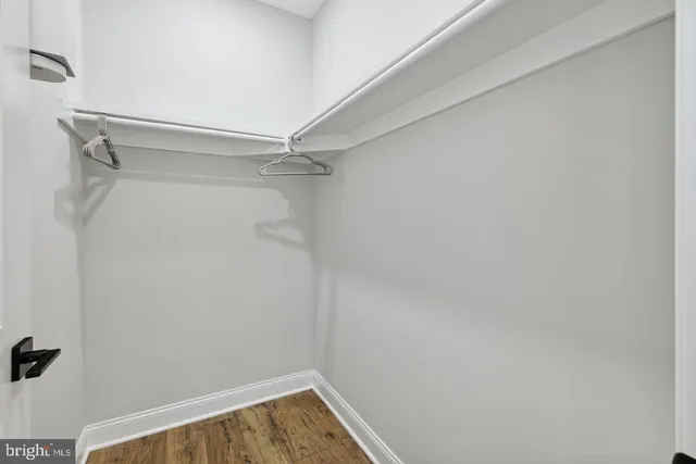 a view of a room with racks on the wall