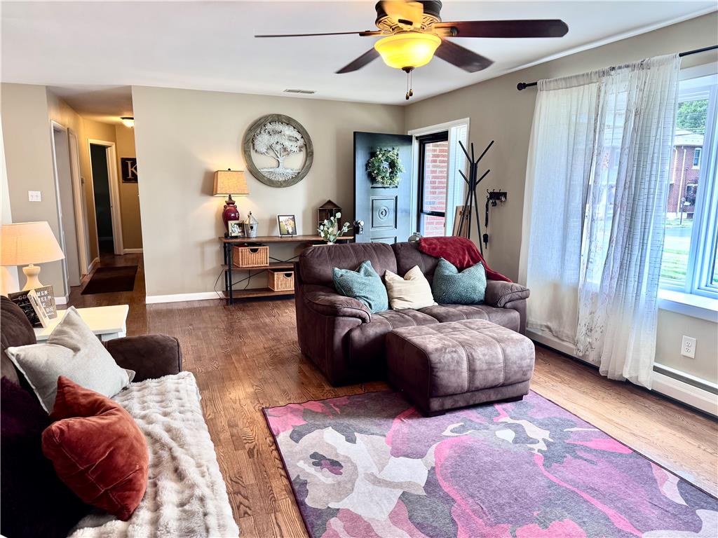 5334 Egypt Road Laurys Station, PA 18059 - Photo 8 of 55 Hardwood flooring and a functional ceiling fan complete this inviting living space.