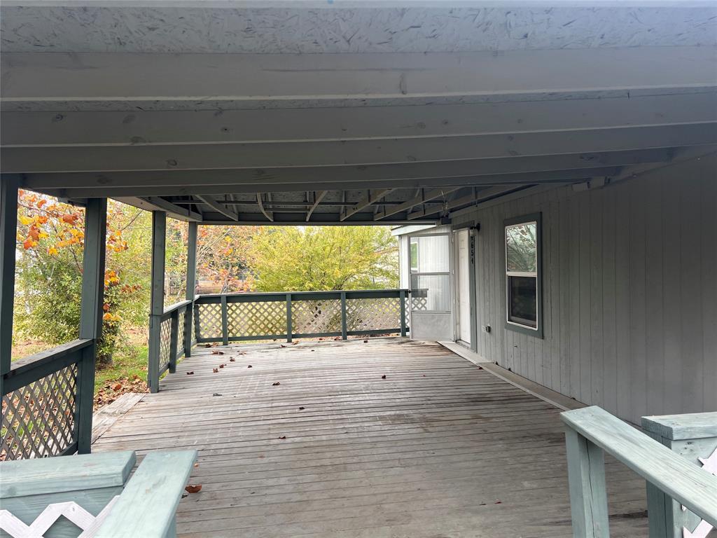 4654 County Road 1078 Princeton, TX 75407 - Photo 7 of 8 a view of a porch with wooden floor and outdoor space