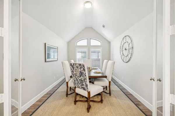 a view of a livingroom with furniture and a window