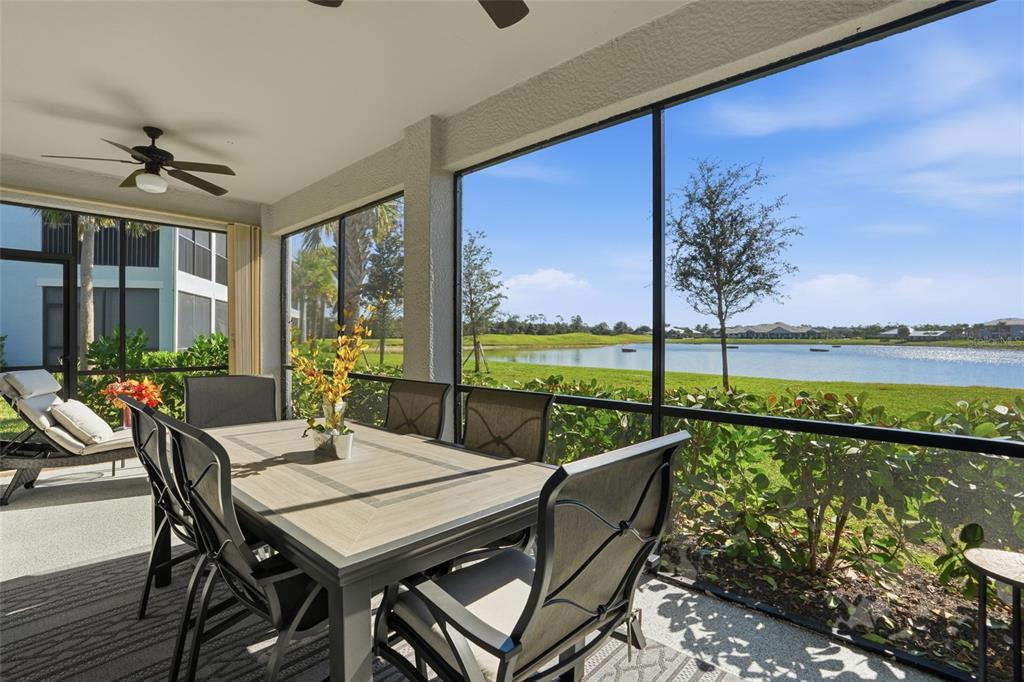 14144 Poppy Field Loop, Unit 4211 Punta Gorda, FL 33955 - Photo 1 of 1 a view of a patio with swimming pool and furniture