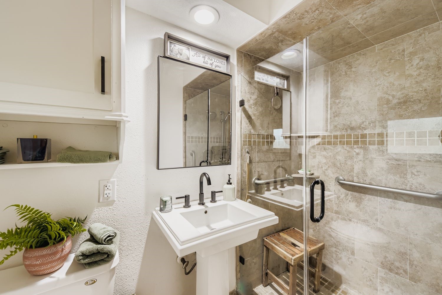 610 Andover Street Spring, TX 77373 - Photo 20 of 26 a bathroom with a sink and a mirror