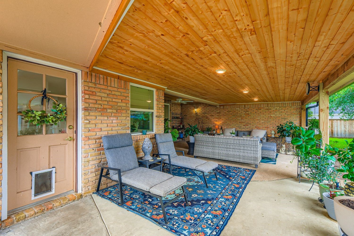 610 Andover Street Spring, TX 77373 - Photo 26 of 26 a balcony with furniture and a potted plant
