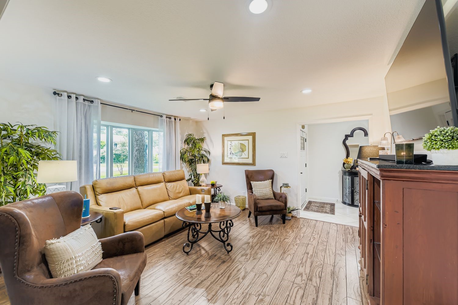 610 Andover Street Spring, TX 77373 - Photo 6 of 26 a living room with furniture and a wooden floor