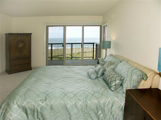 2705 Ribera Road Carmel, CA 93923 - Photo 13 of 22 a bedroom with a bed and a window