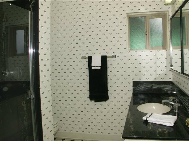 2705 Ribera Road Carmel, CA 93923 - Photo 20 of 22 a bathroom with a sink and a mirror