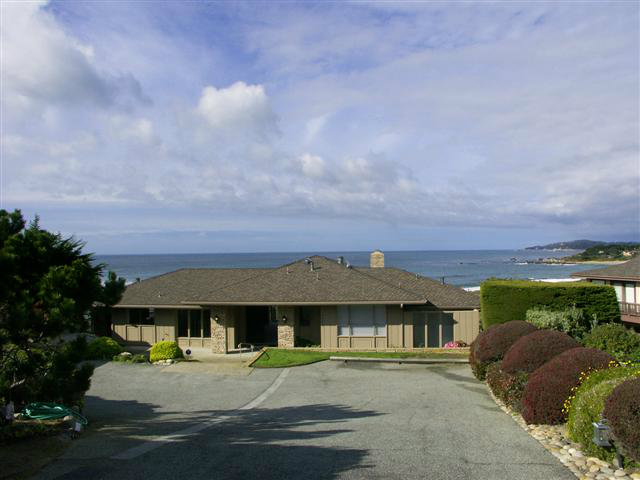 2705 Ribera Road Carmel, CA 93923 - Photo 22 of 22 a front view of a house with a yard