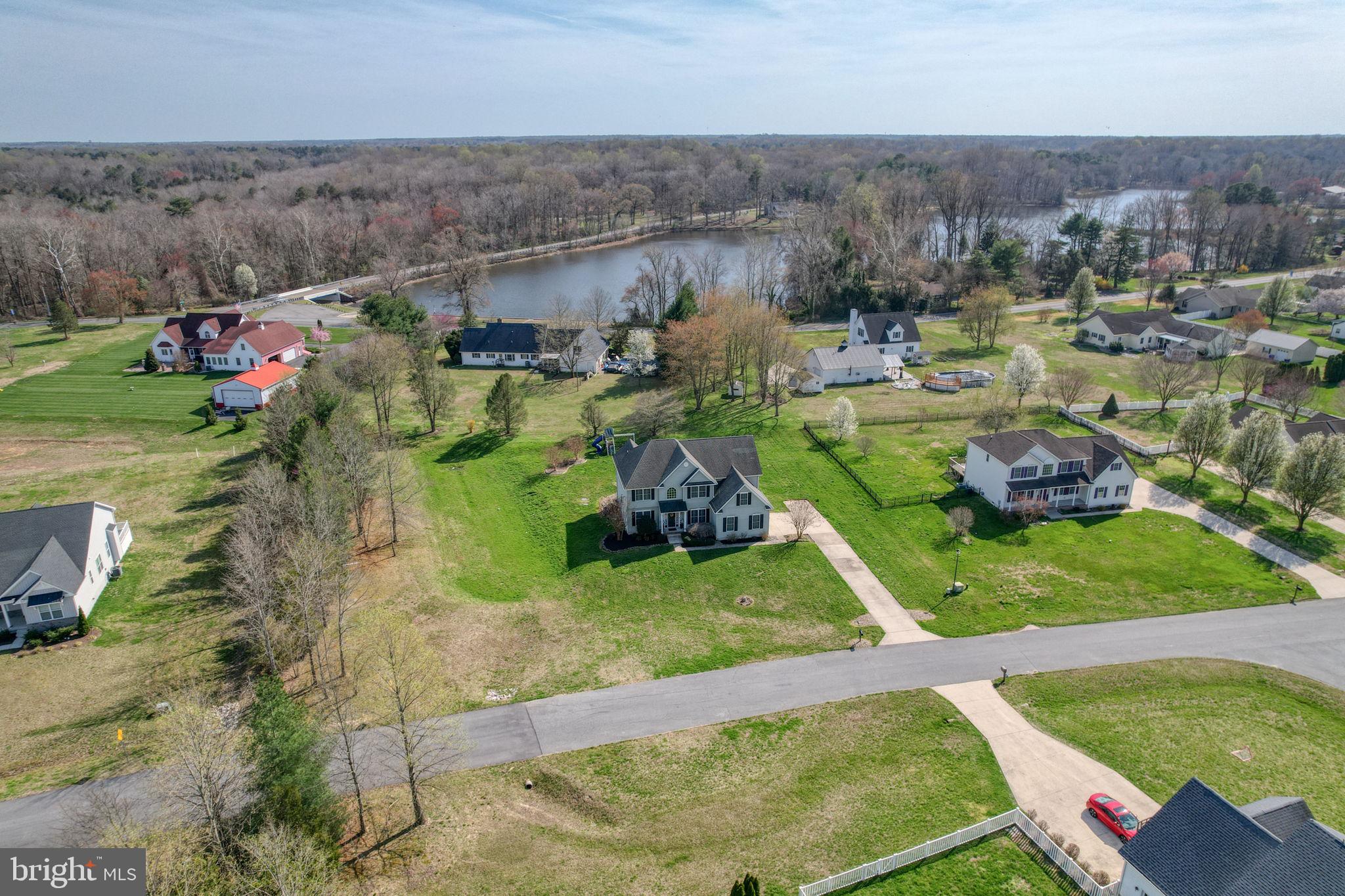 210 Grapevine Way Milford, DE 19963 - Photo 4 of 61 an aerial view of a house and outdoor space