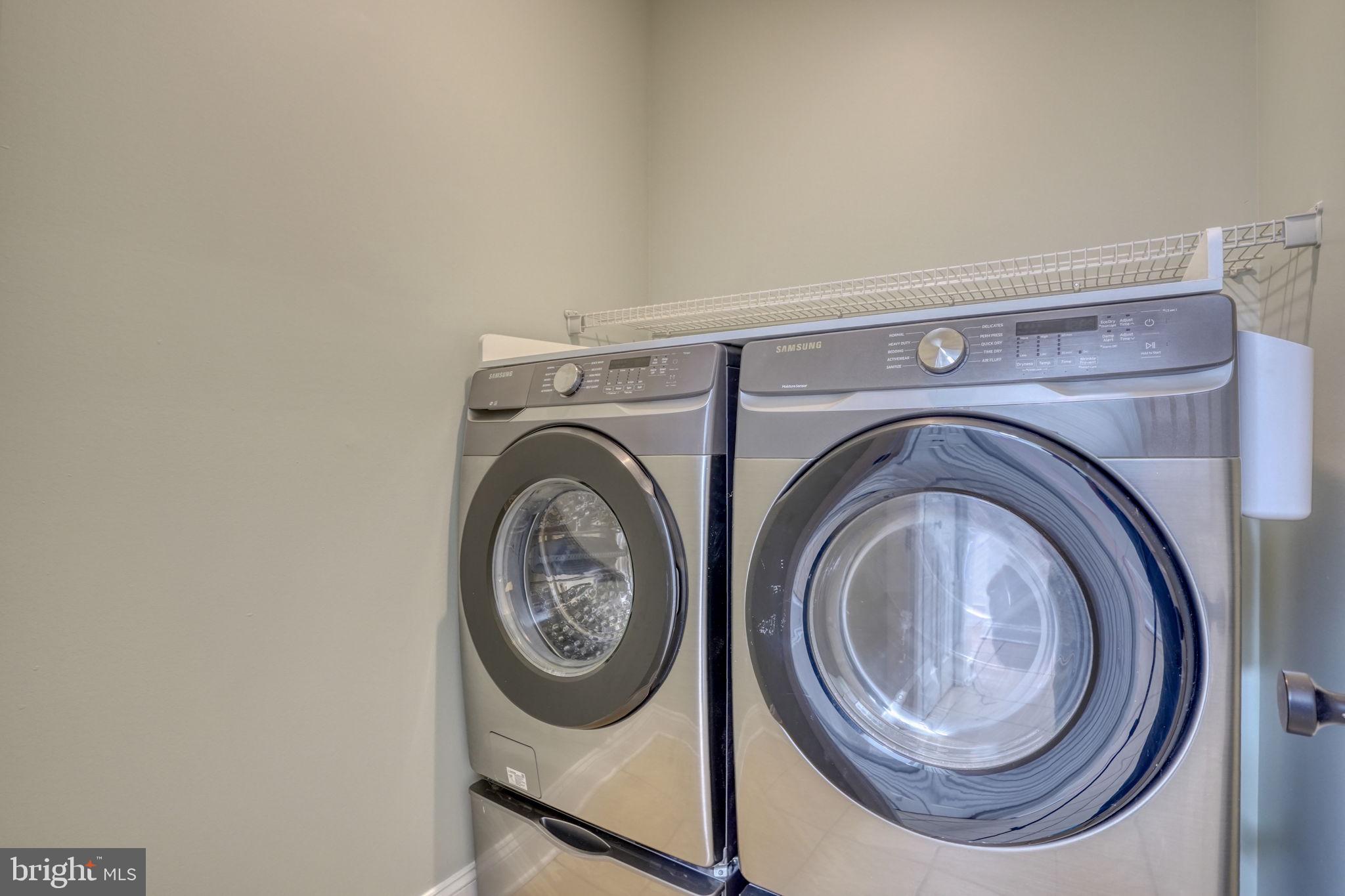 210 Grapevine Way Milford, DE 19963 - Photo 42 of 61 a utility room with dryer and washer