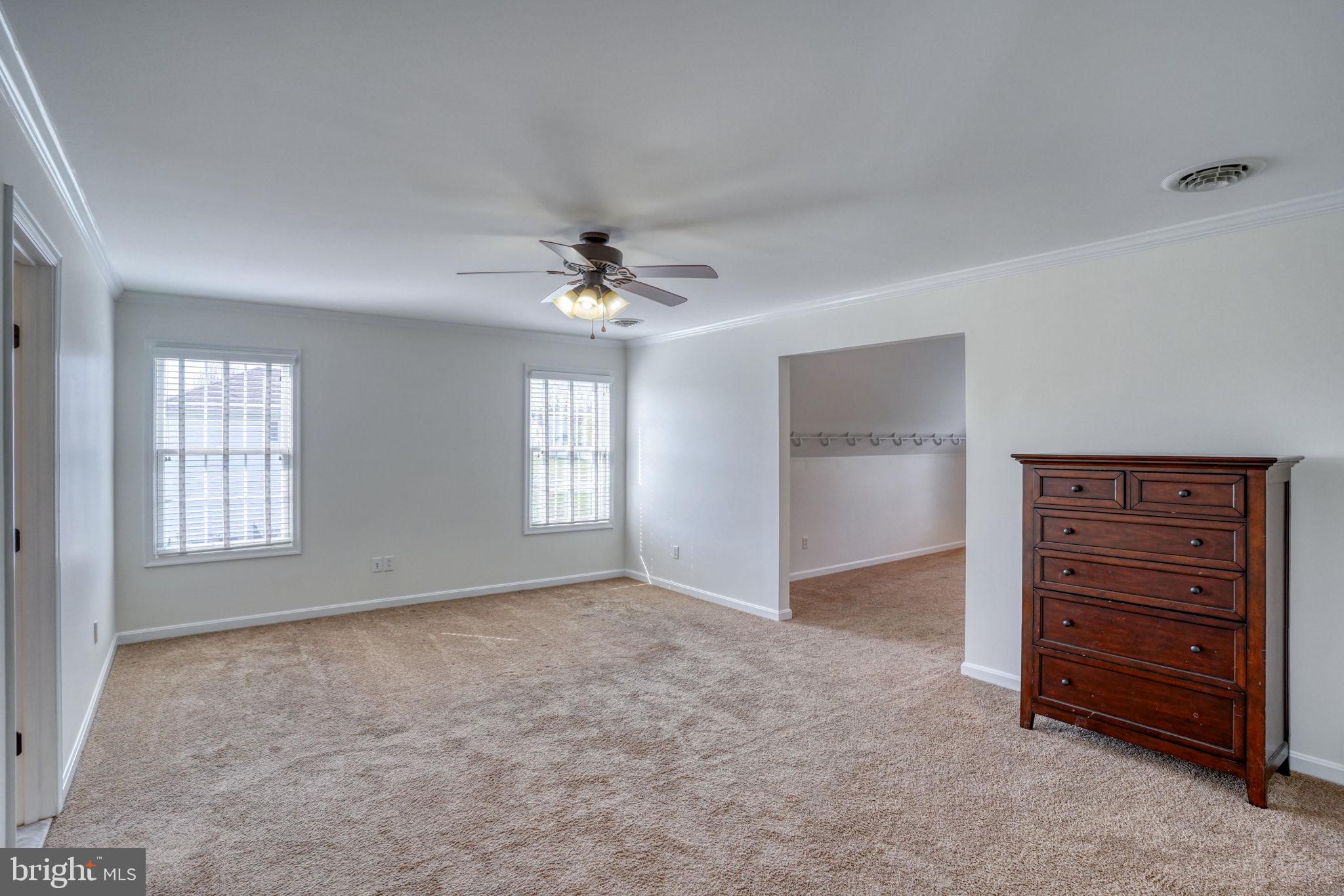 210 Grapevine Way Milford, DE 19963 - Photo 53 of 61 a view of an empty room with a window