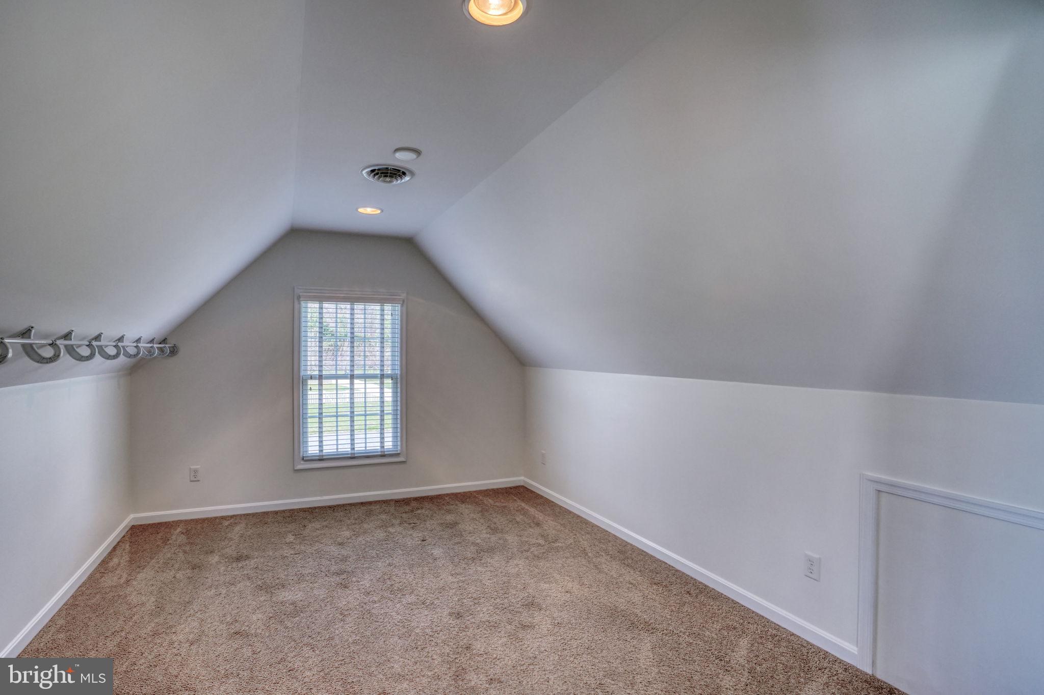 210 Grapevine Way Milford, DE 19963 - Photo 56 of 61 an empty room with windows