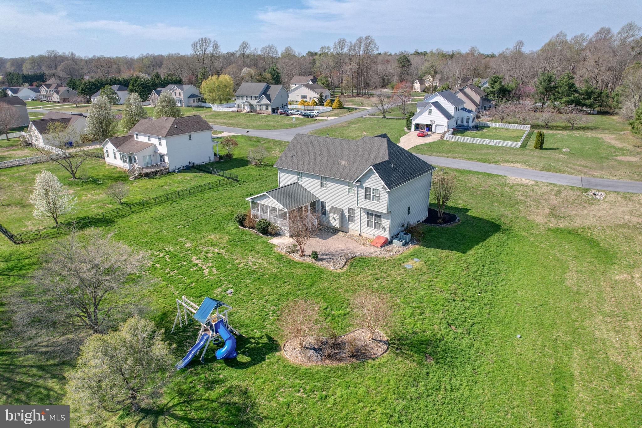 210 Grapevine Way Milford, DE 19963 - Photo 8 of 61 an aerial view of residential houses with outdoor space and trees