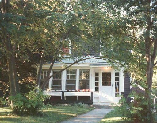 10 Ramapoo Road Ridgefield, CT 06877 - Photo 1 of 1 a front view of a house with a yard