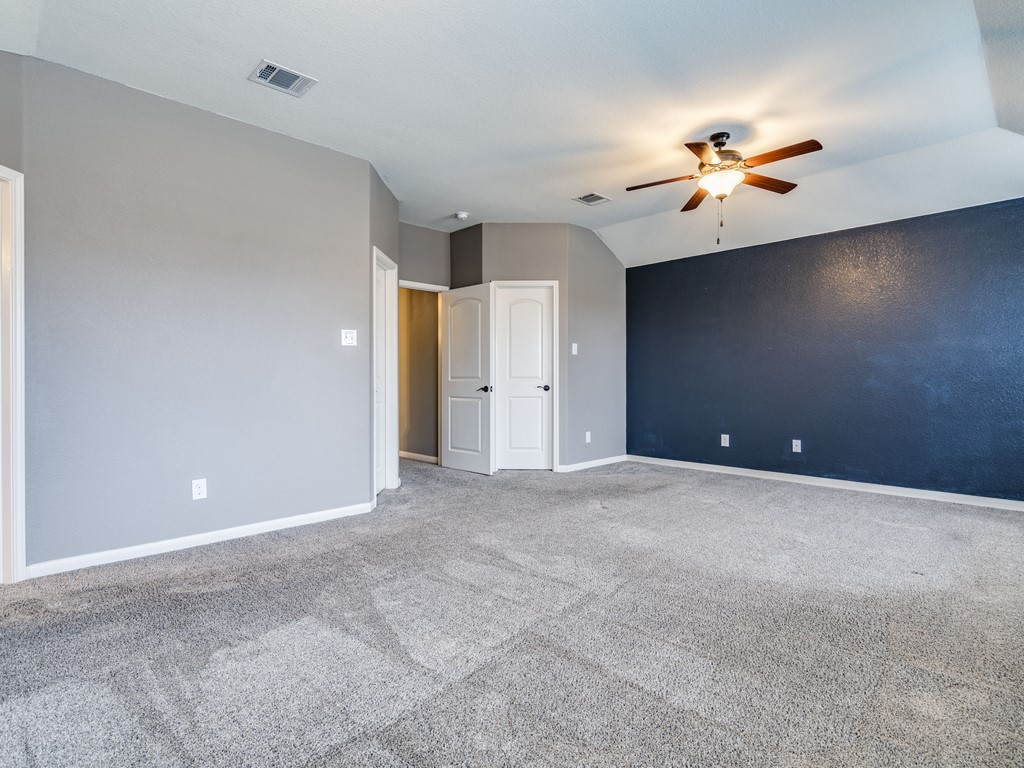 216 Isabel Lane Kyle, TX 78640 - Photo 15 of 27 a view of a livingroom with a ceiling fan