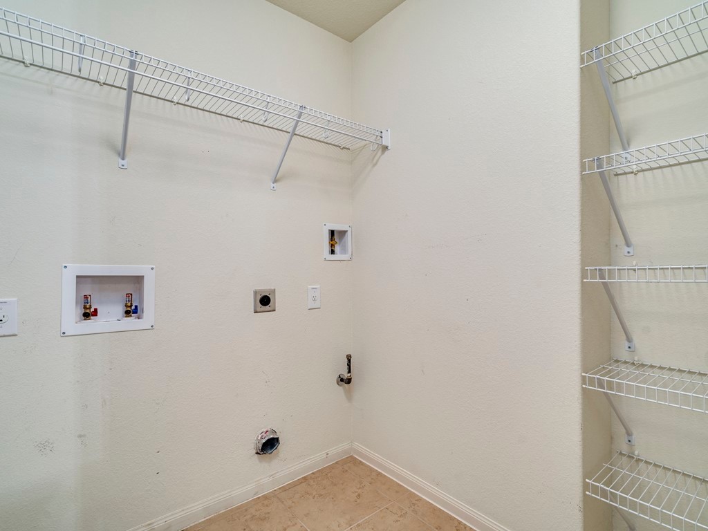 216 Isabel Lane Kyle, TX 78640 - Photo 22 of 27 a bathroom with a shower