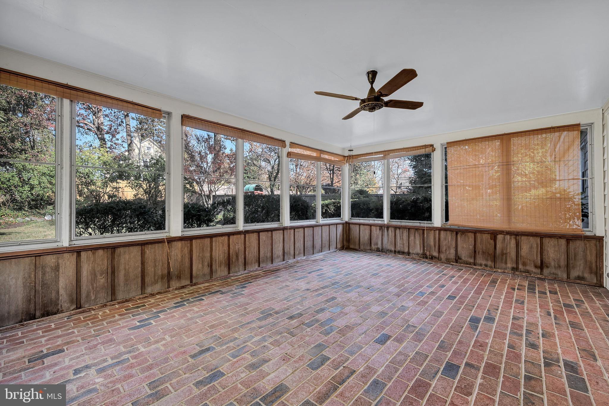 8617 Atwell Road Potomac, MD 20854 - Photo 18 of 39 an empty room with wooden floor and windows