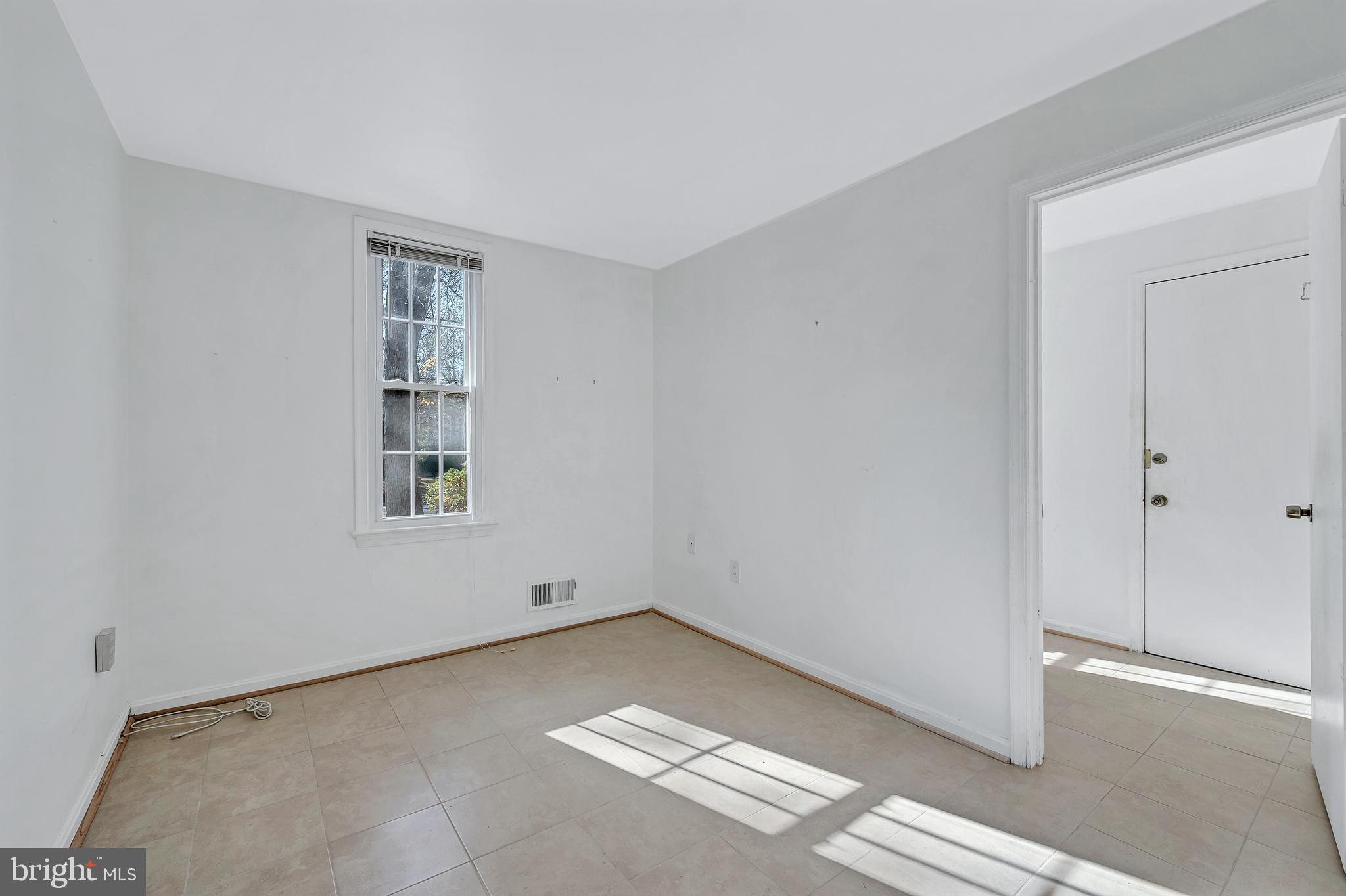 8617 Atwell Road Potomac, MD 20854 - Photo 19 of 39 a view of empty room with windows