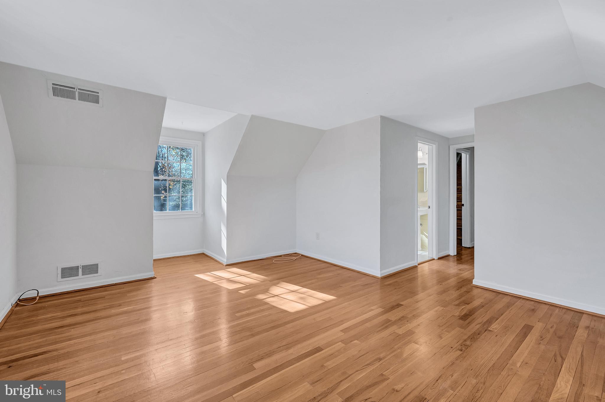 8617 Atwell Road Potomac, MD 20854 - Photo 28 of 39 a view of a livingroom with wooden floor