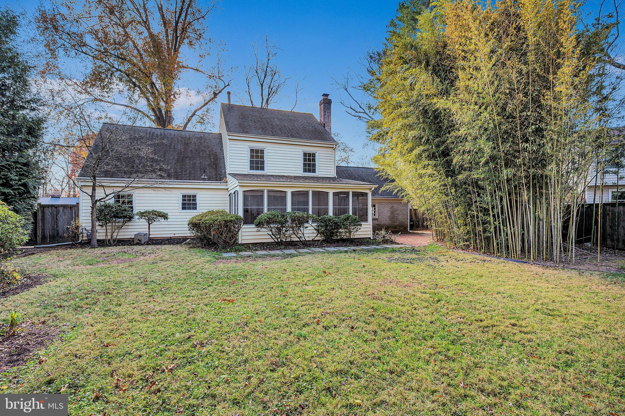 8617 Atwell Road Potomac, MD 20854 - Photo 35 of 39 a front view of a house with a yard