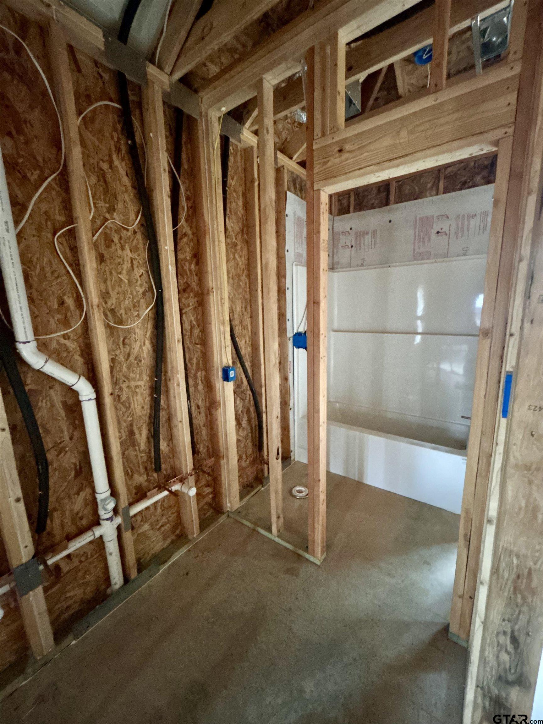614 Oak Street Longview, TX 75605 - Photo 5 of 10 a view of a room with wooden walls