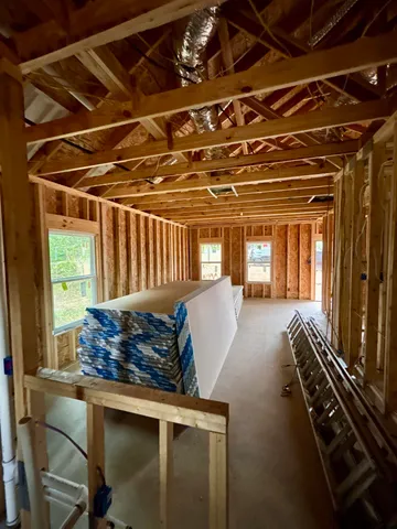 a roof deck with wooden floor