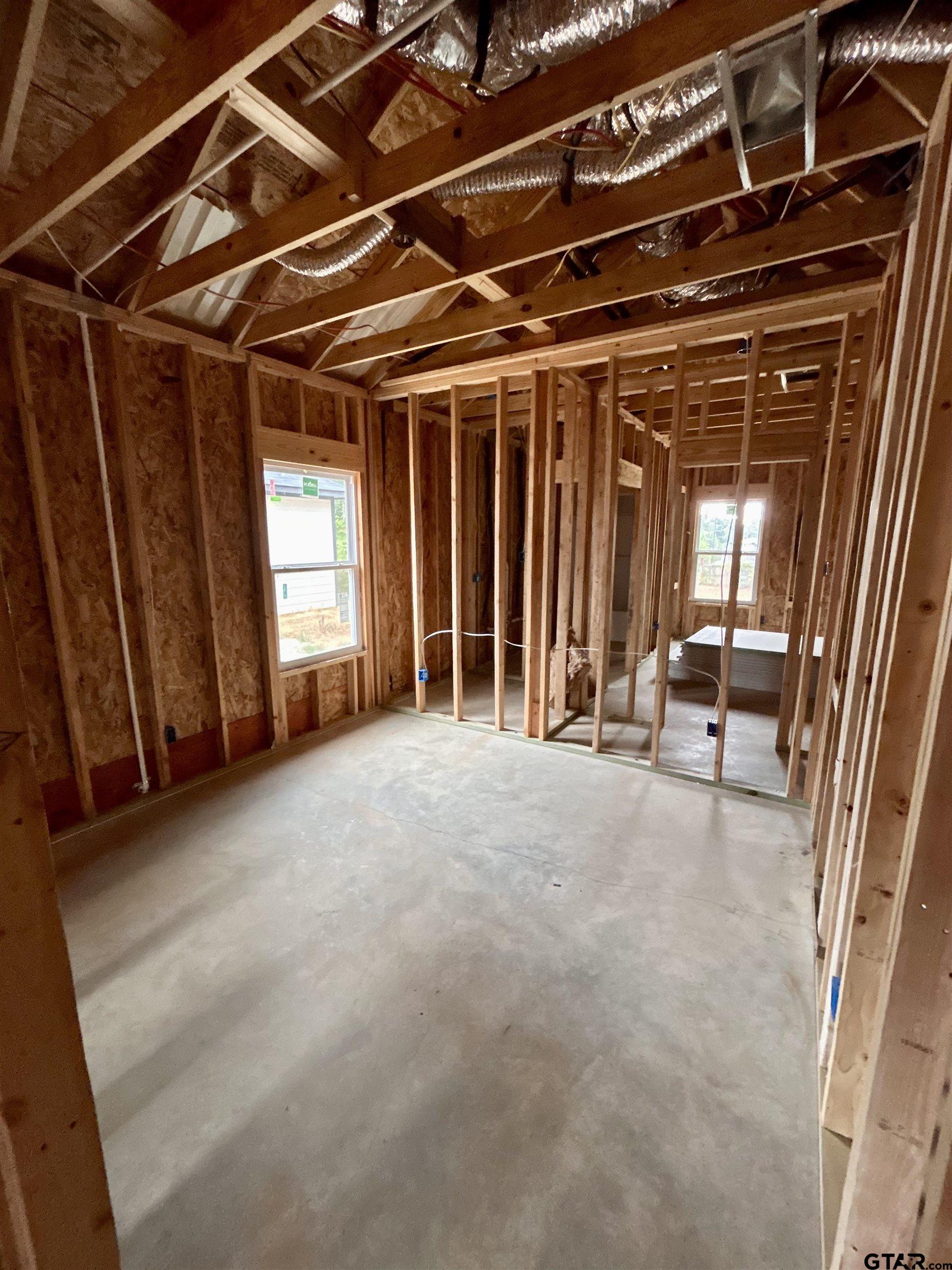 614 Oak Street Longview, TX 75605 - Photo 8 of 10 a view of an empty room with a window