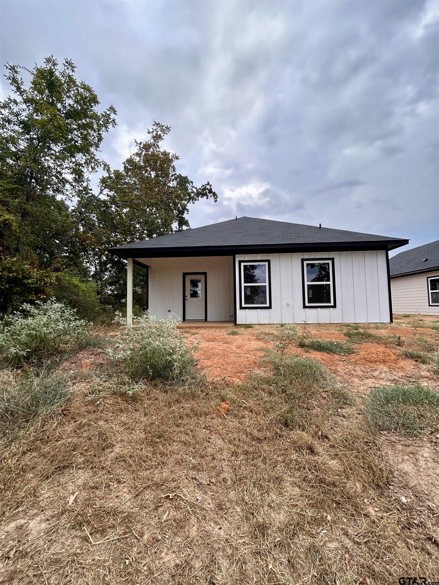 614 Oak Street Longview, TX 75605 - Photo 10 of 10 front view of house with a yard