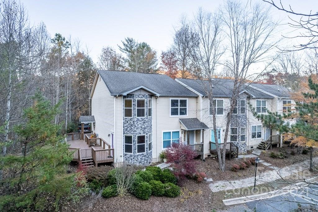 30 Ridge Point, Unit 1 Sylva, NC 28779 - Photo 22 of 42 a front view of a house with garden