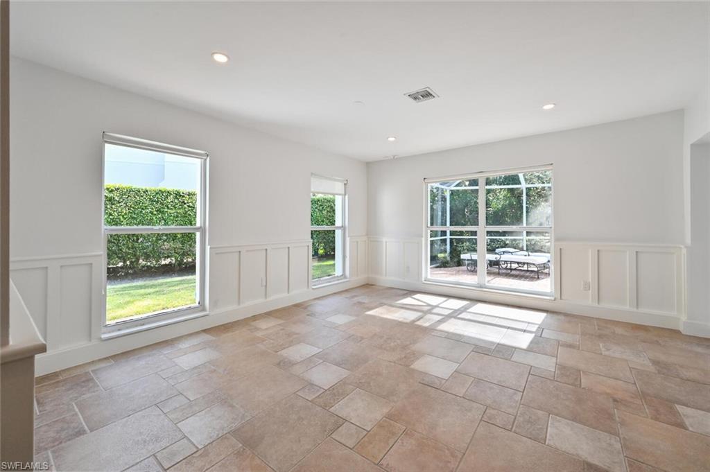 508 Devils Lane Naples, FL 34103 - Photo 14 of 35 a view of an empty room with a window