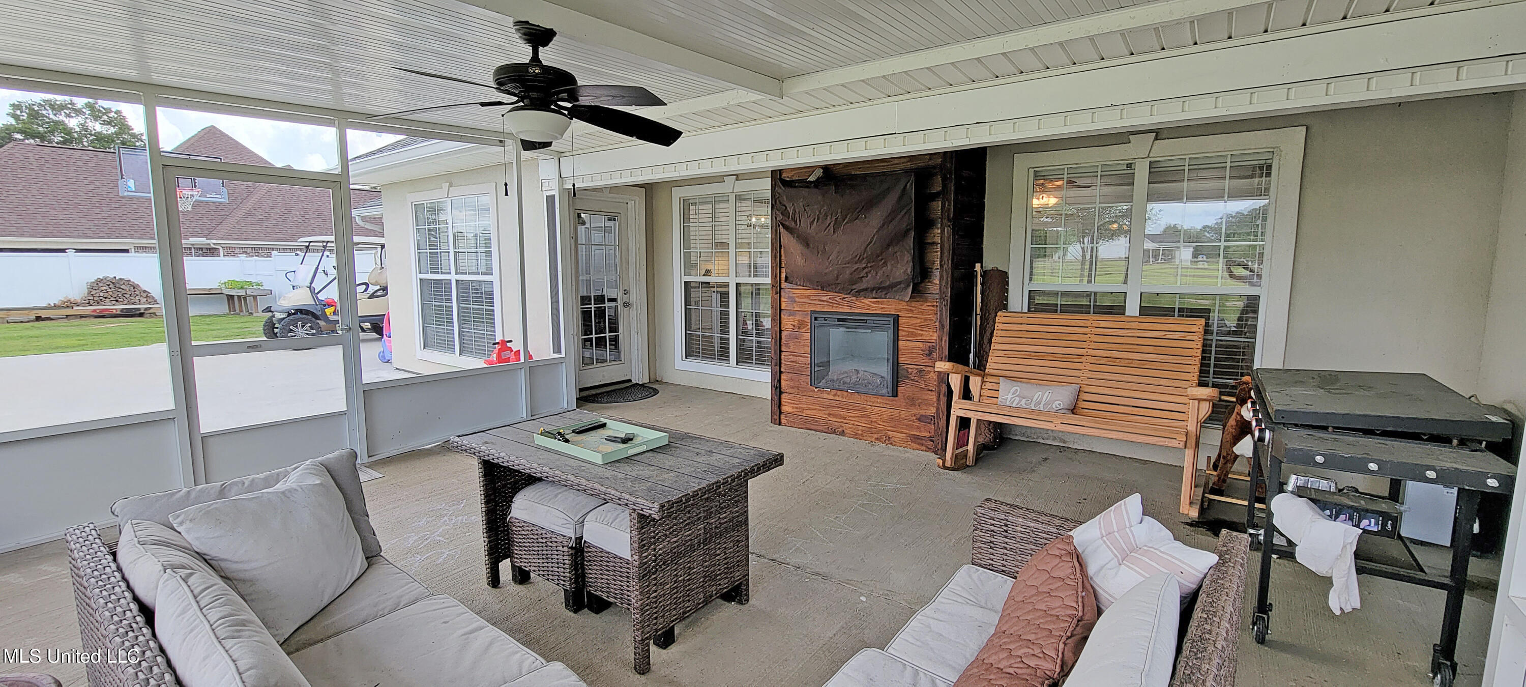 17095 Fenton Dedeaux Road Kiln, MS 39556 - Photo 23 of 23 Screened Porch and Electric Fireplace