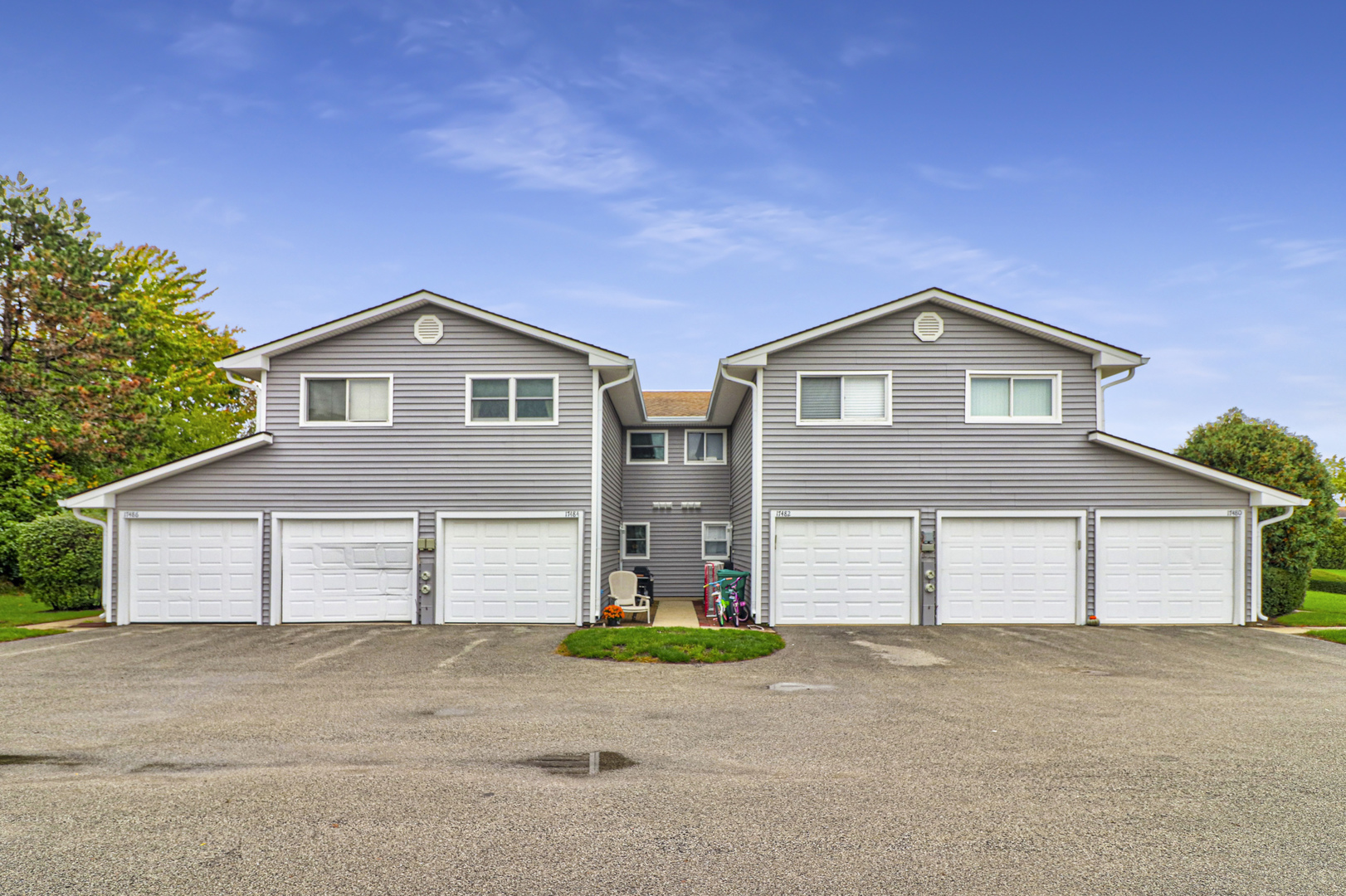 17482 Chestnut Lane Gurnee, IL 60031 - Photo 1 of 23 a front view of a house with a yard and garage