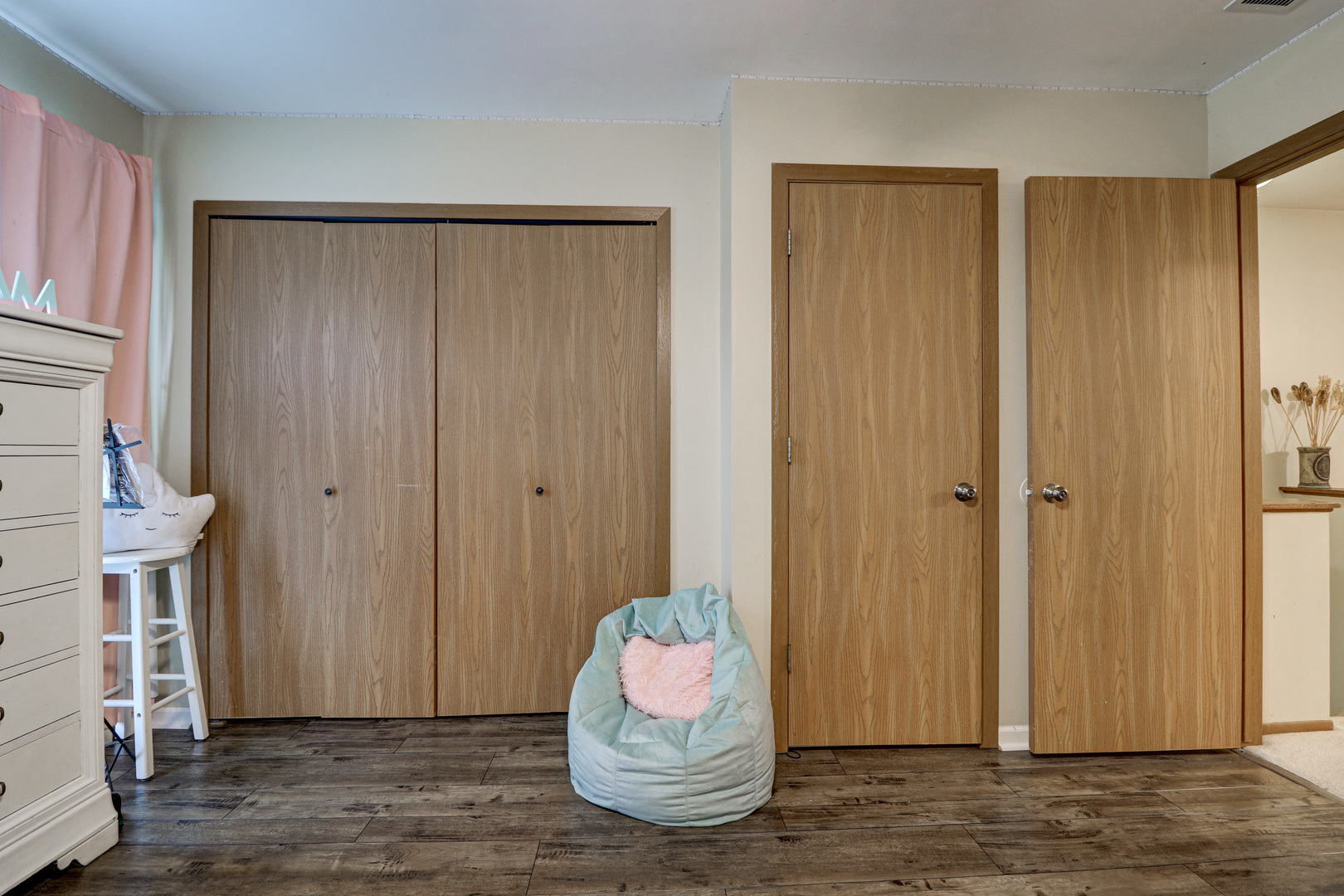 17482 Chestnut Lane Gurnee, IL 60031 - Photo 11 of 23 a view of a room with wooden floor and cabinet